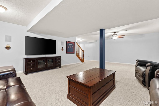 2711 Cascade Lake Dr, Shiloh, IL 62221 - living area featuring carpet, a textured ceiling, stairs, and baseboards