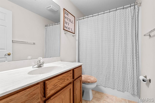 2711 Cascade Lake Dr, Shiloh, IL 62221 - full bathroom featuring vanity, toilet, tile patterned floors, and a shower with curtain