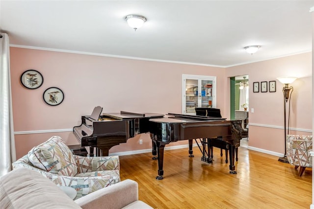 330 Mont Divier Dr, Bonne Terre, MO 63628 - living area with light wood-style flooring, crown molding, and baseboards