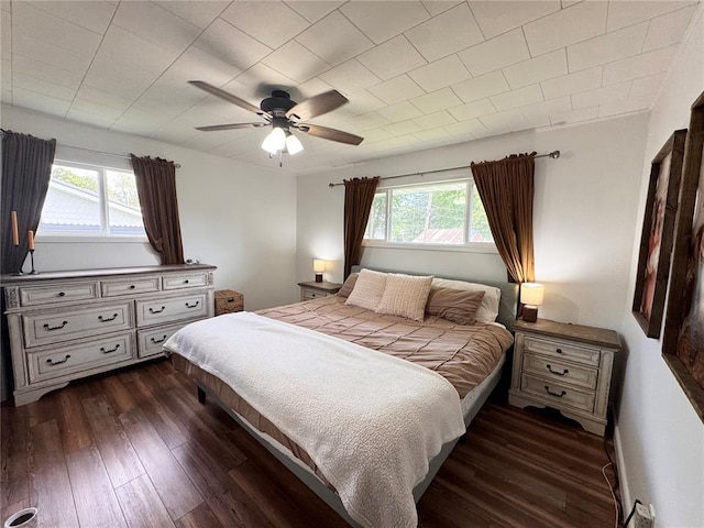 517 W Olive St, Palmyra, MO 63461 - bedroom featuring dark wood-style flooring and ceiling fan