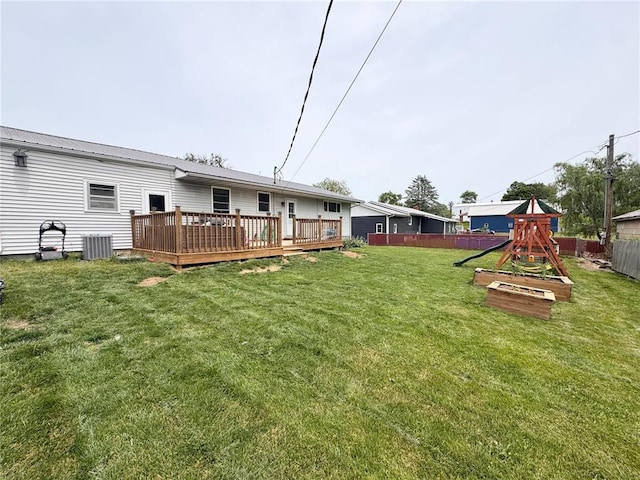 517 W Olive St, Palmyra, MO 63461 - view of yard with central AC, a deck, and a vegetable garden
