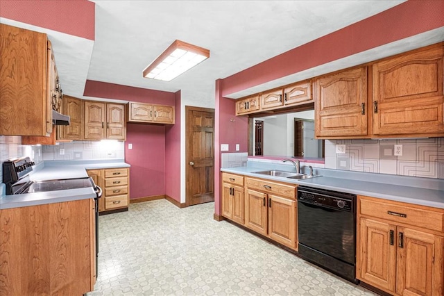 513 Matthews Ln, Waterloo, IL 62298 - kitchen featuring dishwasher, a sink, under cabinet range hood, tasteful backsplash, and light countertops