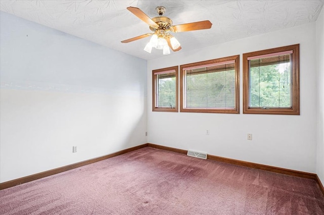 513 Matthews Ln, Waterloo, IL 62298 - carpeted spare room featuring healthy amount of natural light, baseboards, and ceiling fan