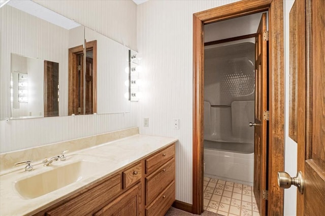 513 Matthews Ln, Waterloo, IL 62298 - bathroom with vanity, tile patterned floors, wallpapered walls, and shower / tub combination