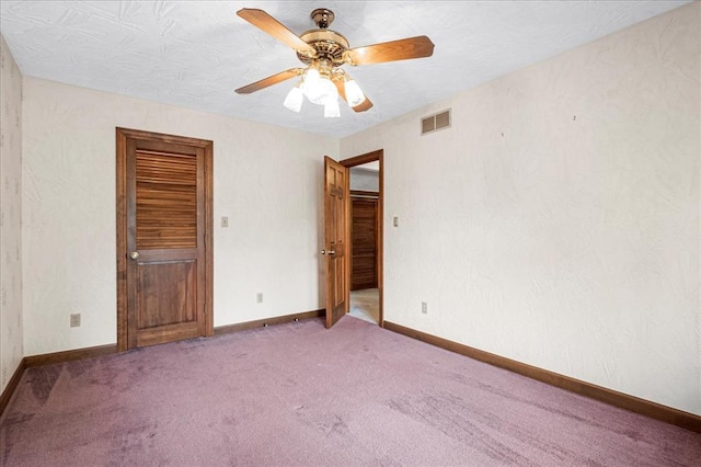 513 Matthews Ln, Waterloo, IL 62298 - carpeted empty room with a ceiling fan and baseboards