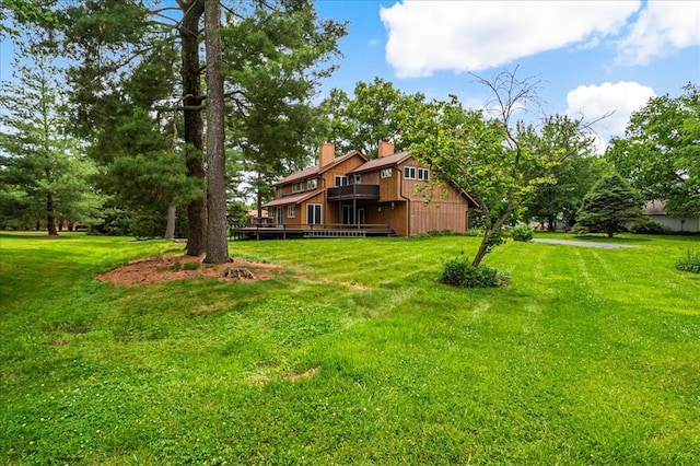 513 Matthews Ln, Waterloo, IL 62298 - view of grassy yard with a wooden deck