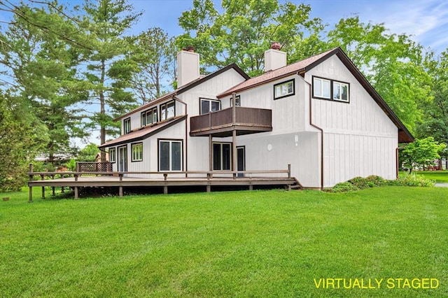 513 Matthews Ln, Waterloo, IL 62298 - back of house featuring a balcony, a chimney, a yard, and a deck