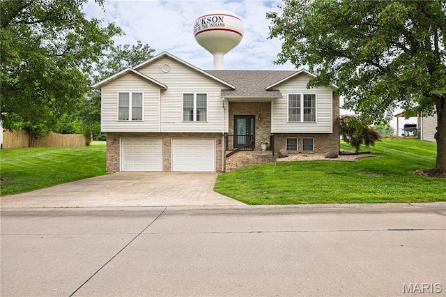 781 N W Ln, Jackson, MO 63755 - bi-level home featuring driveway, a garage, and brick siding