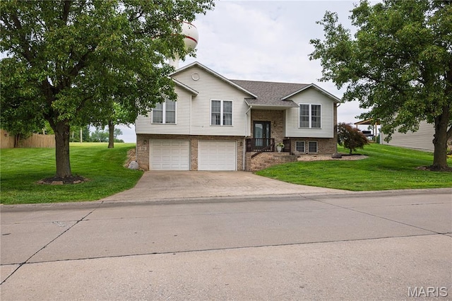 781 N W Ln, Jackson, MO 63755 - bi-level home with concrete driveway, a garage, and brick siding