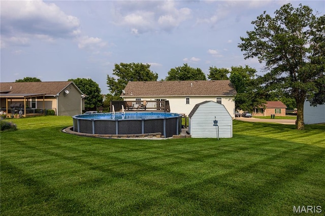 781 N W Ln, Jackson, MO 63755 - back of house featuring a lawn, an outdoor pool, and a wooden deck