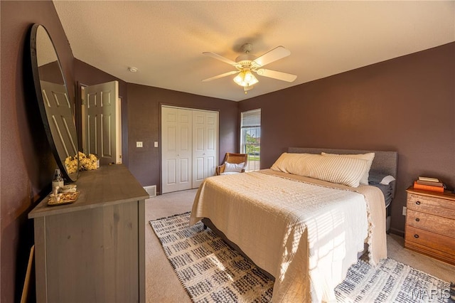 781 N W Ln, Jackson, MO 63755 - bedroom with light colored carpet, a closet, a ceiling fan, and baseboards