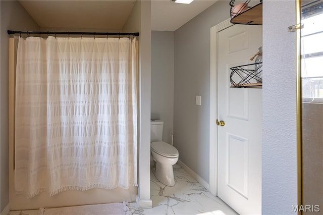 781 N W Ln, Jackson, MO 63755 - full bathroom with marble look tiles, toilet, and curtained shower