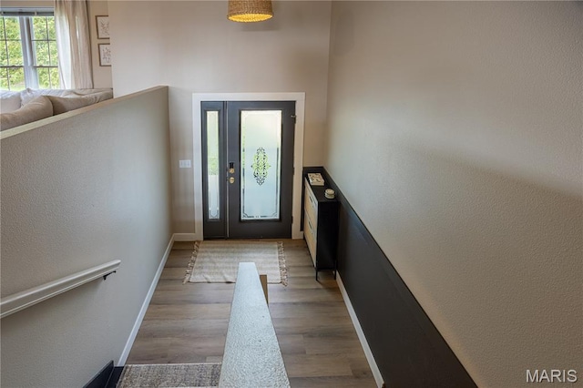 781 N W Ln, Jackson, MO 63755 - entryway with wood finished floors, a textured wall, and baseboards