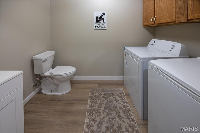 781 N W Ln, Jackson, MO 63755 - laundry area with independent washer and dryer, baseboards, and light wood-style flooring