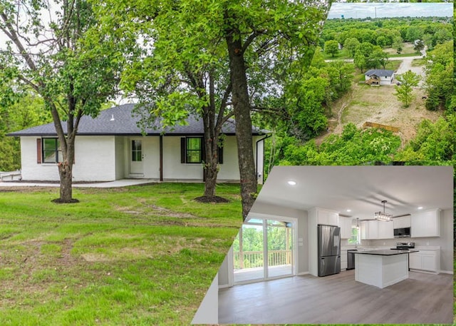 405 Julie Ln, Holts Summit, MO 65043 - view of front facade with exterior kitchen, stucco siding, a front lawn, and roof with shingles
