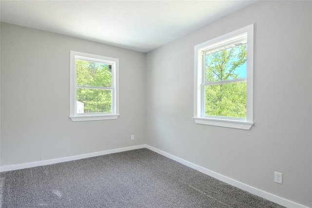 405 Julie Ln, Holts Summit, MO 65043 - empty room featuring baseboards and carpet