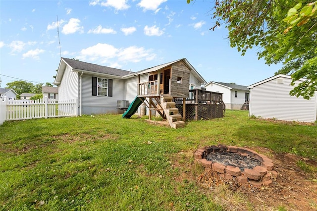 114 Edwards Ln, Park Hills, MO 63601 - rear view of house featuring an outdoor fire pit, a wooden deck, a playground, and cooling unit