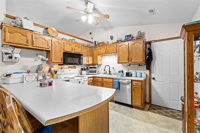 114 Edwards Ln, Park Hills, MO 63601 - kitchen with black microwave, stainless steel dishwasher, electric range, a peninsula, and vaulted ceiling