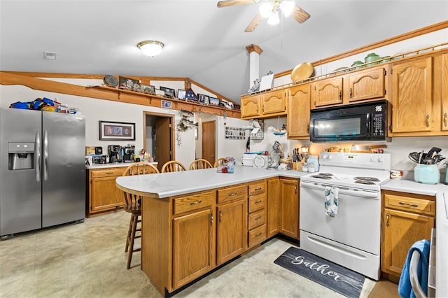 114 Edwards Ln, Park Hills, MO 63601 - kitchen featuring stainless steel fridge with ice dispenser, black microwave, electric range, a peninsula, and vaulted ceiling