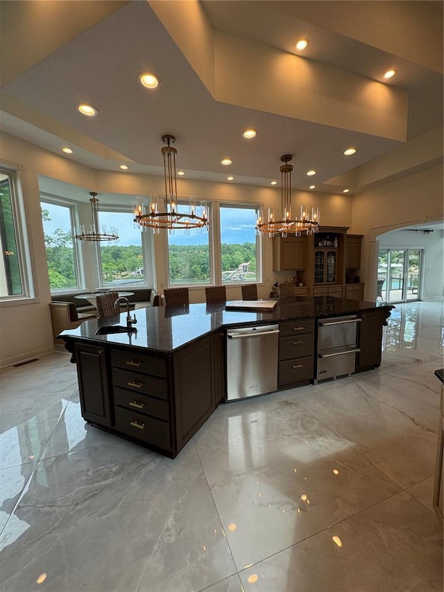 149 Thornwood Cir, Sunrise Beach, MO 65079 - kitchen featuring dishwasher, a chandelier, healthy amount of natural light, light marble finish floors, and recessed lighting