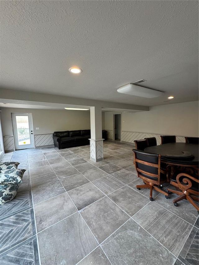 149 Thornwood Cir, Sunrise Beach, MO 65079 - basement with a textured ceiling and recessed lighting