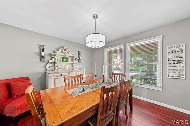 2917 Royal Gorge Ct, Oakville Township, MO 63129 - dining space featuring wood finished floors, baseboards, and a chandelier