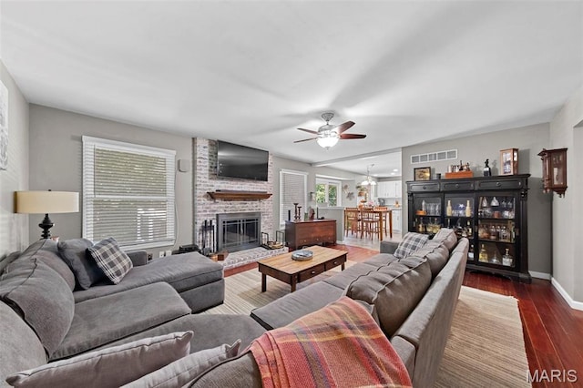 2917 Royal Gorge Ct, Oakville Township, MO 63129 - living area featuring ceiling fan, baseboards, a fireplace, and wood finished floors