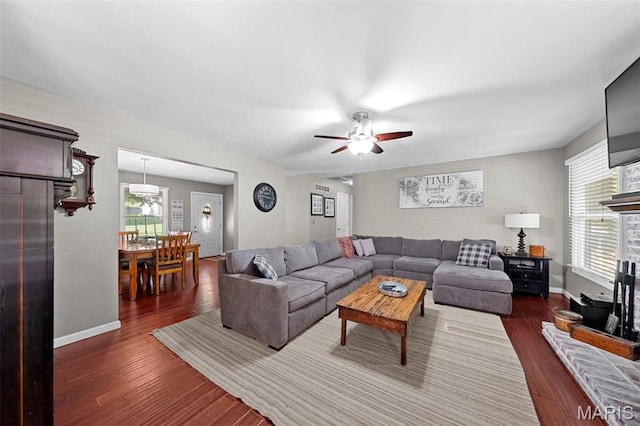 2917 Royal Gorge Ct, Oakville Township, MO 63129 - living room with dark wood-style floors, healthy amount of natural light, and ceiling fan