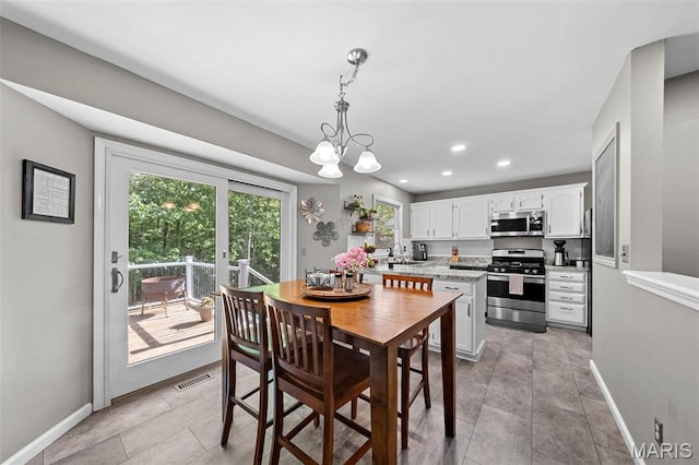 2917 Royal Gorge Ct, Oakville Township, MO 63129 - dining space featuring recessed lighting, a chandelier, baseboards, and light tile patterned floors