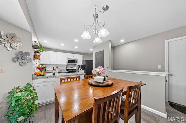 2917 Royal Gorge Ct, Oakville Township, MO 63129 - dining area featuring a chandelier, recessed lighting, and baseboards