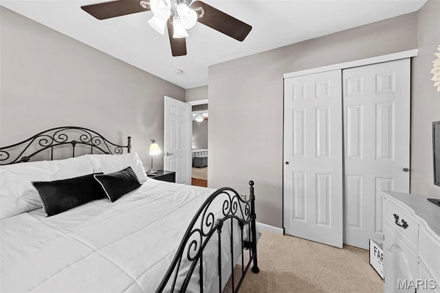 2917 Royal Gorge Ct, Oakville Township, MO 63129 - bedroom featuring light colored carpet, a closet, and a ceiling fan