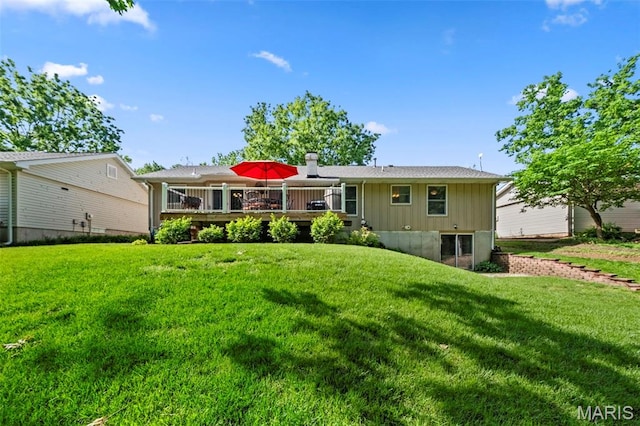 2917 Royal Gorge Ct, Oakville Township, MO 63129 - rear view of property featuring a yard, a wooden deck, and board and batten siding
