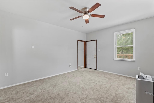 8838 Argyle Ave, Overland, MO 63114 - unfurnished bedroom featuring carpet, baseboards, and ceiling fan