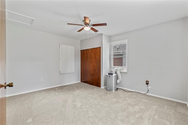 8838 Argyle Ave, Overland, MO 63114 - carpeted spare room with ceiling fan, baseboards, and attic access
