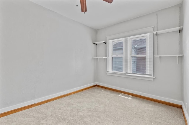 8838 Argyle Ave, Overland, MO 63114 - empty room with baseboards, carpet flooring, and a ceiling fan