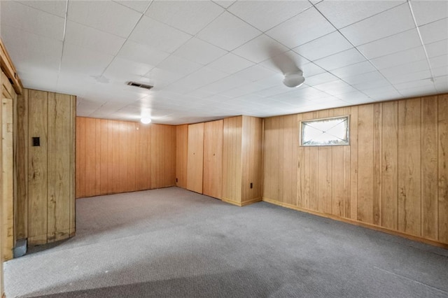 8838 Argyle Ave, Overland, MO 63114 - below grade area featuring carpet floors and wooden walls