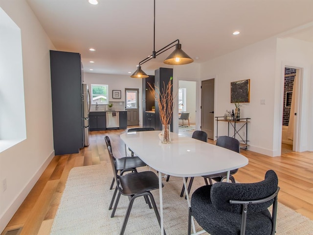 6343 Tholozan, Saint Louis, MO 63109 - dining room featuring light wood-type flooring, recessed lighting, and baseboards
