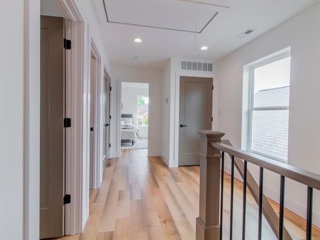 6343 Tholozan, Saint Louis, MO 63109 - hallway with attic access, recessed lighting, light wood finished floors, baseboards, and an upstairs landing