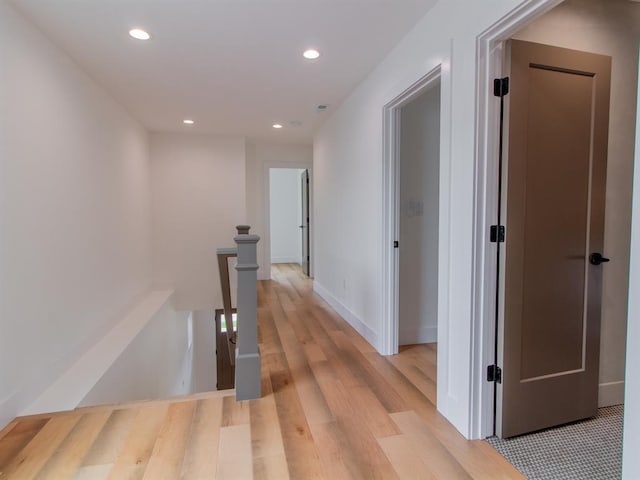 6343 Tholozan, Saint Louis, MO 63109 - corridor with an upstairs landing, recessed lighting, and light wood-style floors