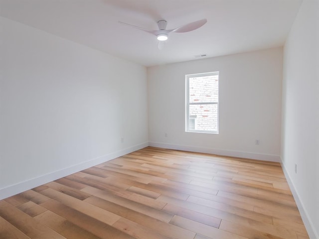 6343 Tholozan, Saint Louis, MO 63109 - empty room with light wood finished floors, ceiling fan, and baseboards