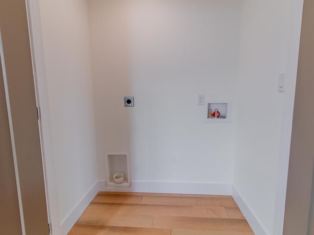 6343 Tholozan, Saint Louis, MO 63109 - washroom with electric dryer hookup, hookup for a washing machine, light wood-style flooring, and baseboards