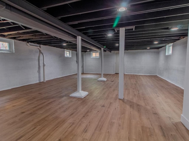 6343 Tholozan, Saint Louis, MO 63109 - basement with healthy amount of natural light and wood finished floors