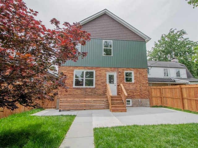 6343 Tholozan, Saint Louis, MO 63109 - view of front of property featuring entry steps, a patio area, and brick siding