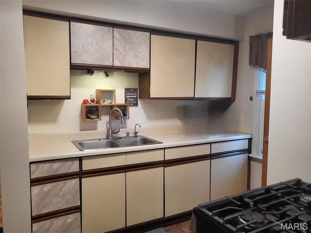 14 Banbury Ct, Crestwood, MO 63126 - kitchen featuring a sink, light countertops, cooktop, and black gas stove