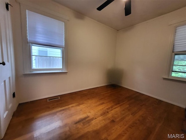 14 Banbury Ct, Crestwood, MO 63126 - spare room featuring wood finished floors, a ceiling fan, and baseboards