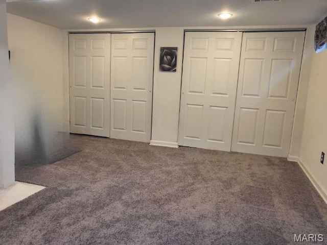 14 Banbury Ct, Crestwood, MO 63126 - unfurnished bedroom with carpet floors, multiple closets, and baseboards