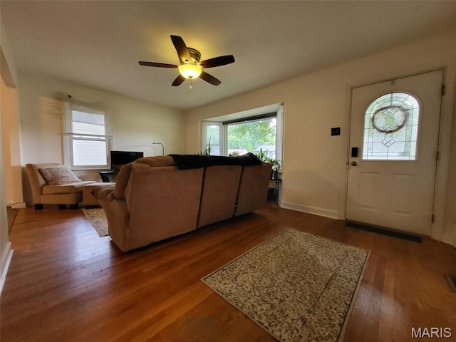 14 Banbury Ct, Crestwood, MO 63126 - living room with wood finished floors, a ceiling fan, and baseboards