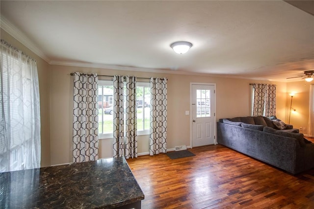 155 Roberts St, Jerseyville, IL 62052 - living room featuring dark wood finished floors, crown molding, baseboards, and a ceiling fan