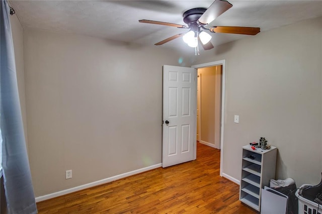 155 Roberts St, Jerseyville, IL 62052 - bedroom featuring wood finished floors, baseboards, and ceiling fan