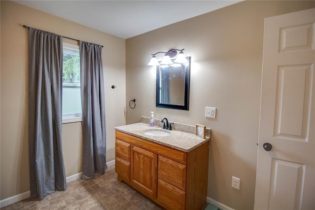 155 Roberts St, Jerseyville, IL 62052 - bathroom with vanity and baseboards
